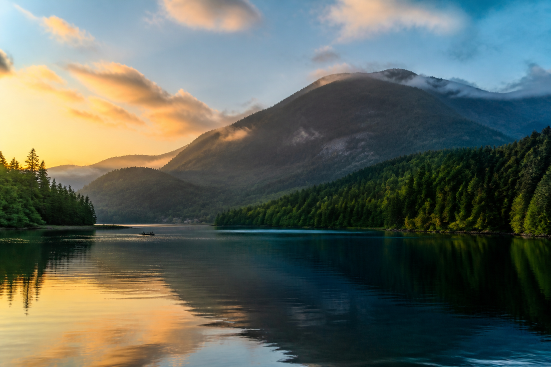 Blue Mountain Lake at dawn surrounded by expansive Adirondack forest