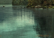 Adirondack Blue Mountain Landscape puzzle: shoreline reflections and printed credit