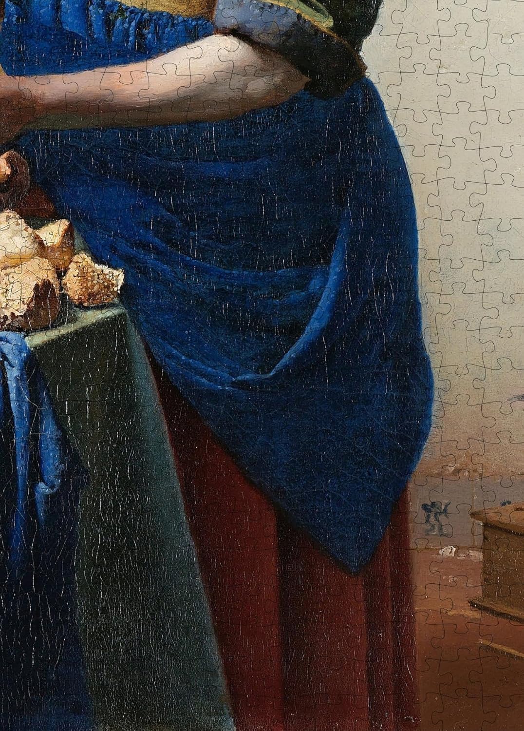 The Milkmaid by Vermeer puzzle: blue apron close-up