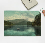 Adirondack Blue Mountain Landscape puzzle: puzzle and box on white tabletop