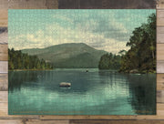 Adirondack Blue Mountain Landscape puzzle: completed puzzle on wooden tabletop