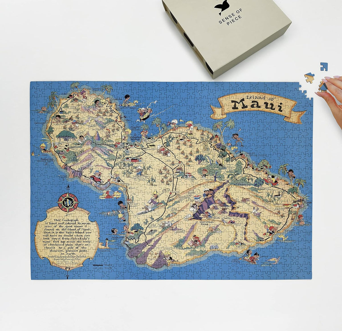 Maui Pictorial Map puzzle: puzzle and box on white tabletop