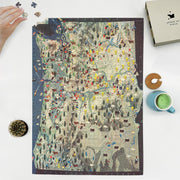 Pacific Northwest Pictorial Map puzzle: puzzle and box on white tabletop