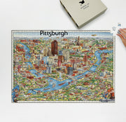 Pittsburgh Illustrated City Map puzzle: puzzle and box on white tabletop